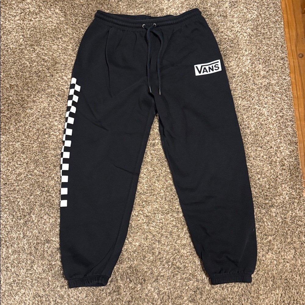 Vans Black Joggers with White Checkered Stripe. Size medium.